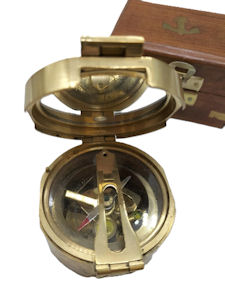 Brass Brunton-style nautical compass in a wooden presentation box. 